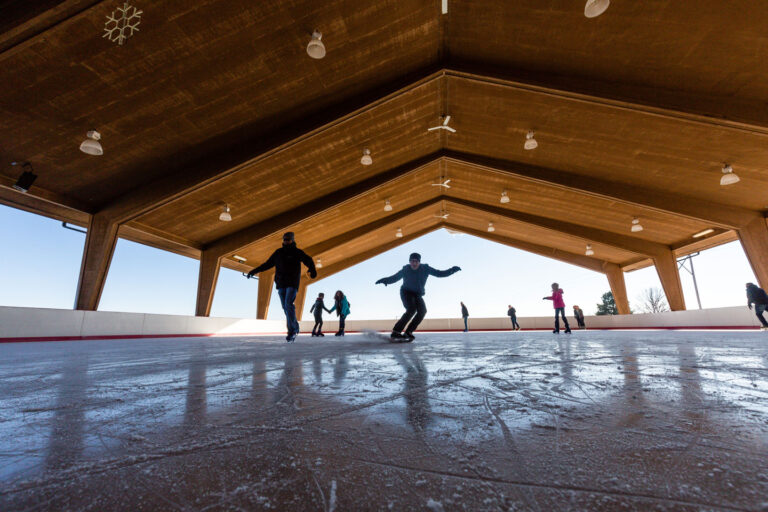 Pictured is the Activity Center at Eugene T. Mahoney State Park in Cass County. The ice skating rink is shown. Blake Morris from Gothenburg is skating toward the camera. Dec. 8, 2018. Copyright NEBRASKAland Magazine, Nebraska Game and Parks Commission.