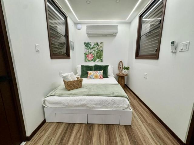 Habitación doble con decoración tropical y aire acondicionado en Hacienda del Sur