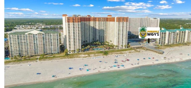Vista aérea del complejo Shores of Panama 315 con playa de arena blanca y aguas turquesas en Panama City Beach