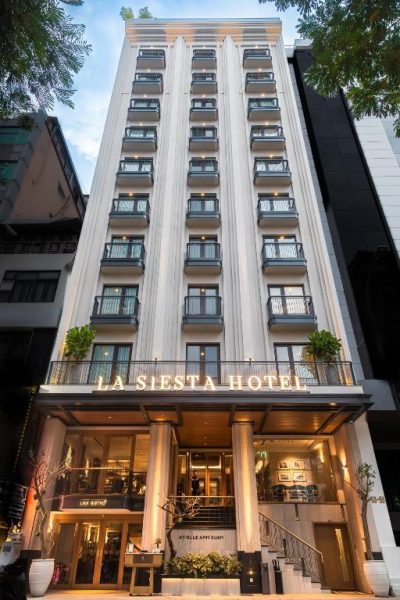Fachada exterior del La Siesta Premium Saigon Central, hotel boutique de lujo en Ho Chi Minh