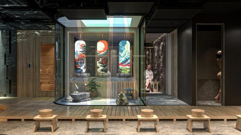 Zona de spa japonés con cabina de vidrio, bancos de madera y cuencos en Hotel du Lac Signature