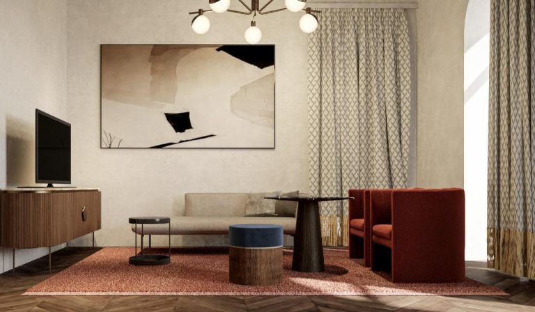 Salón moderno del Villa Argentina con sofá beige, sillón rojo, mesa de cristal y decoración de estilo contemporáneo