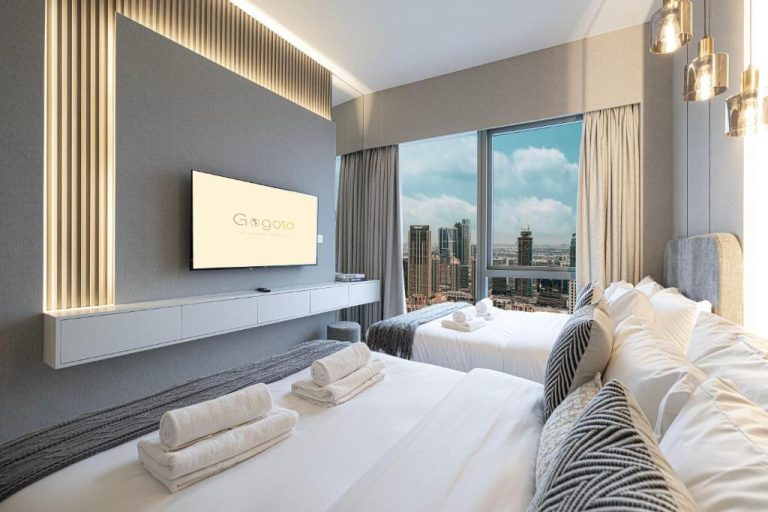 Habitación doble de lujo con vistas a los rascacielos de Dubái en Gogoto1 Ultra LUX Burj View