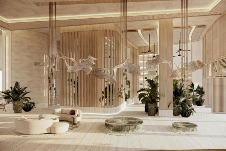 Lobby de lujo con escultura colgante artesanal y vegetación tropical en The St Regis Costa Mujeres Resort Cancún