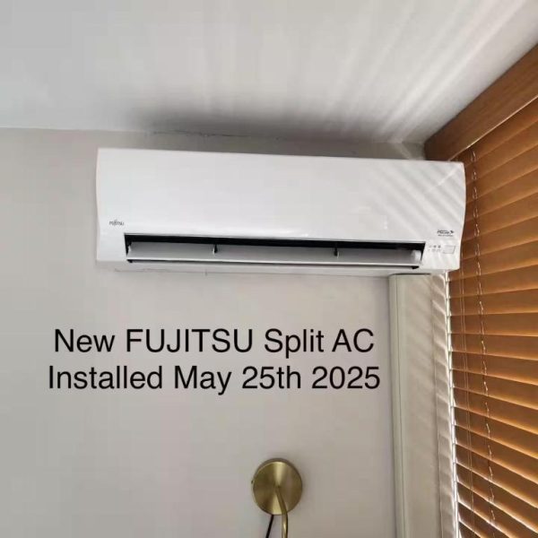 Nuevo aire acondicionado split Fujitsu instalado en el Honolulu Hotel, sistema de climatización moderno en habitación