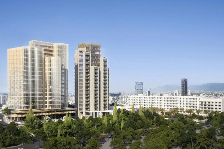 Vista exterior de las torres modernas del The Landmark Nicosia Autograph Collection con jardines urbanos