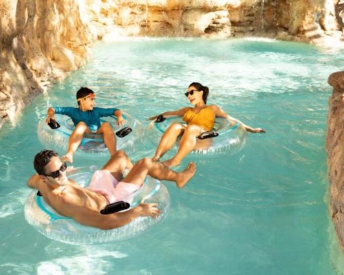Family enjoying lazy river at orlando resort